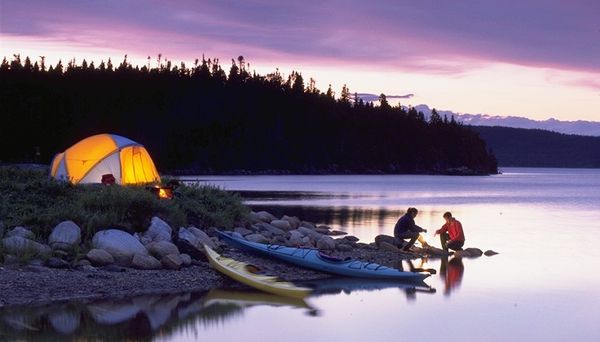 camping tent, fishing kayak and sleeping bags